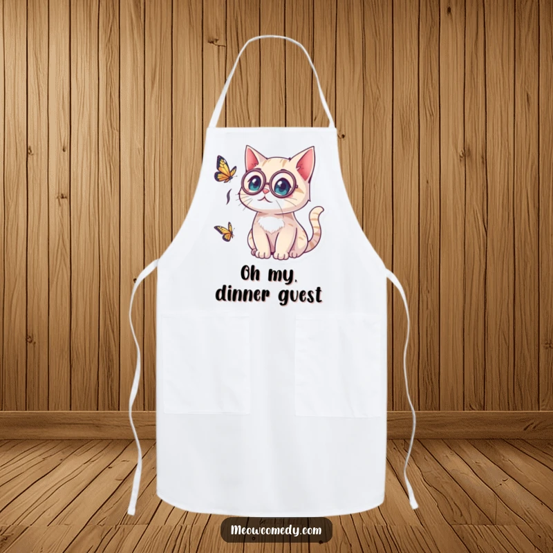 Funny kawaii cat wearing a monocle, looking surprised by a butterfly, perfect for a stylish and amusing cooking experience on an apron.
