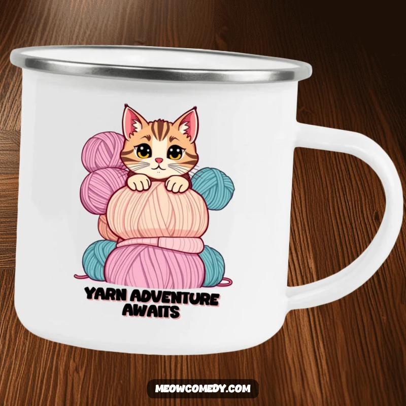 Funny cat camping mug illustrating a mischievous cat peeking playfully over a tall stack of colorful yarn balls.