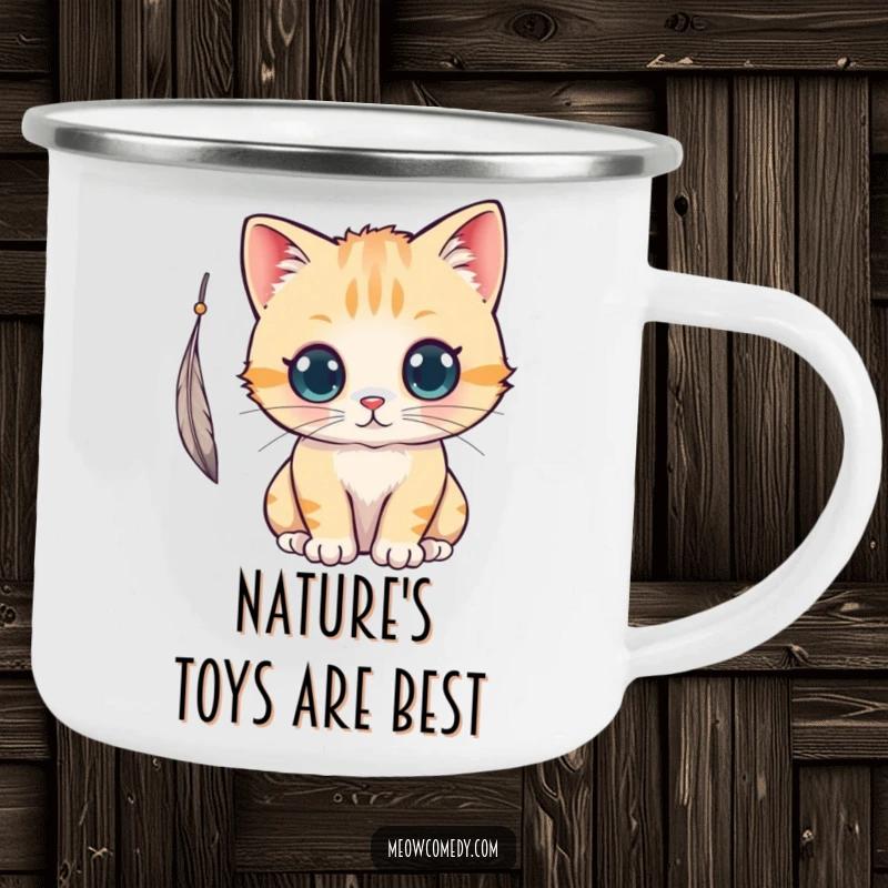 Funny kawaii cat batting at a feather, holding a camping mug, for outdoor fun and humor.
