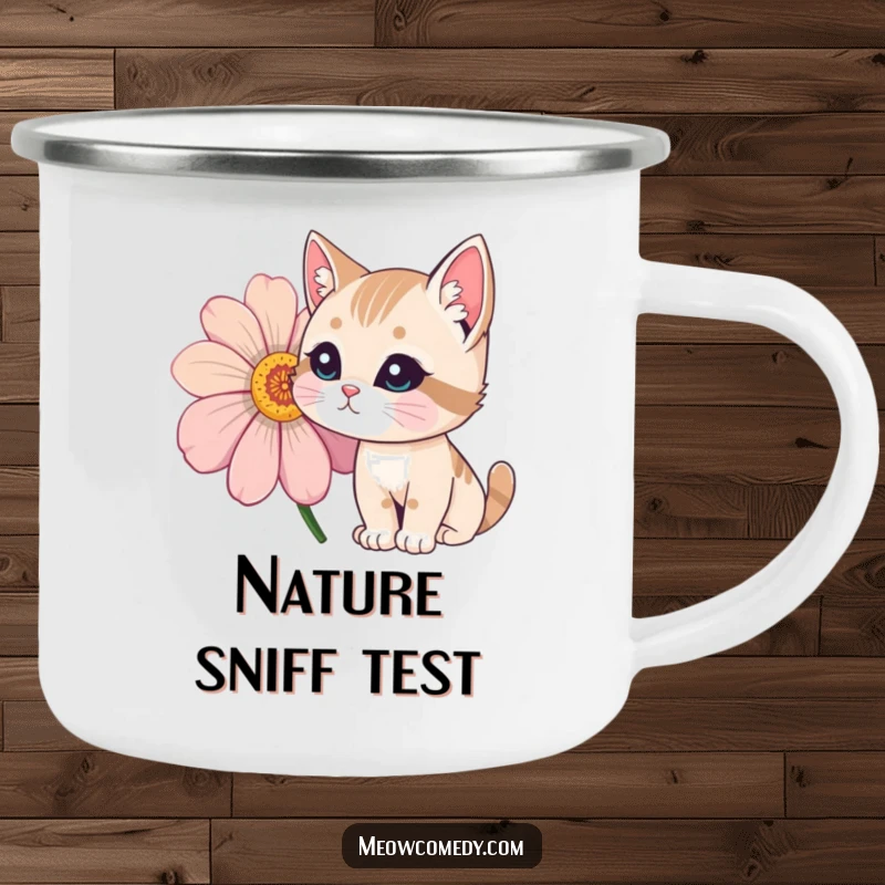 Funny Cat Camping Mug showing a curious cat sniffing a large, colorful flower in a natural outdoor setting.