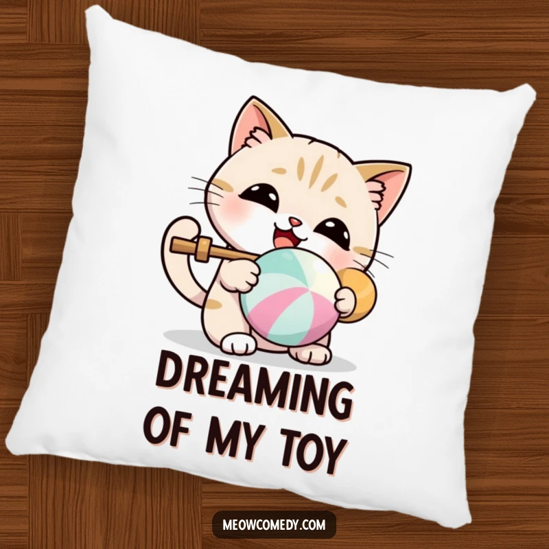 Funny pillow featuring a kawaii cat enjoying batting a colorful ball, adding cute and humorous decor.