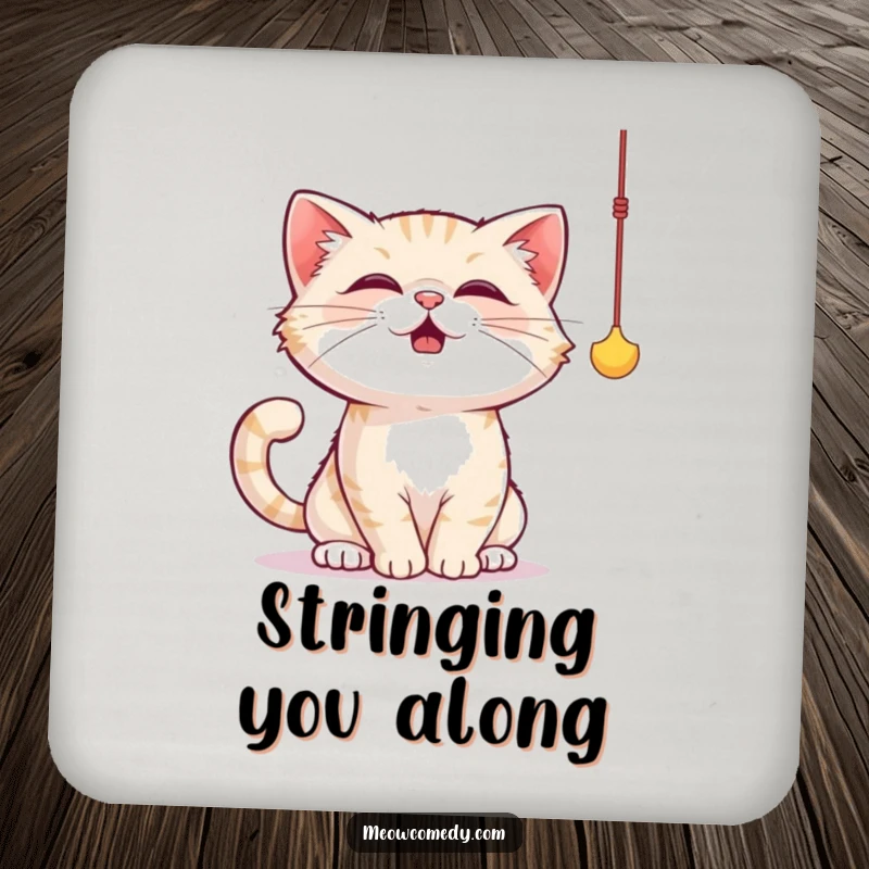 Funny cat coasters showing a cat comically batting at a dangling string toy with its paws, full of playful energy.