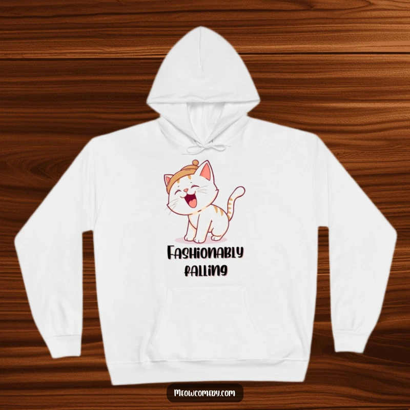 Funny cat hoodie, keeping you warm while depicting a silly cat tripping over its tail with a tiny hat, for ultimate cozy humor.