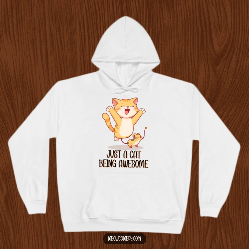 Funny hoodie graphic of a cat leaping with excitement to catch a toy mouse, perfect for cozy, humorous wear.