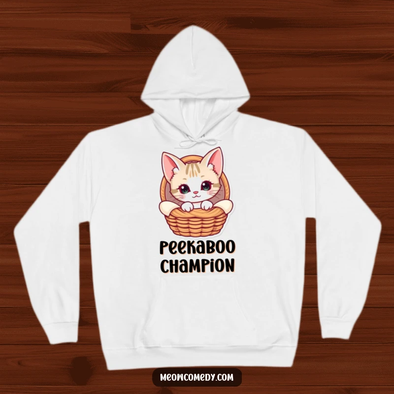 Funny Kawaii Cat Hoodie, illustrating a cat with prominent ears peeking from a cozy basket, offering warmth and a sense of gentle curiosity.