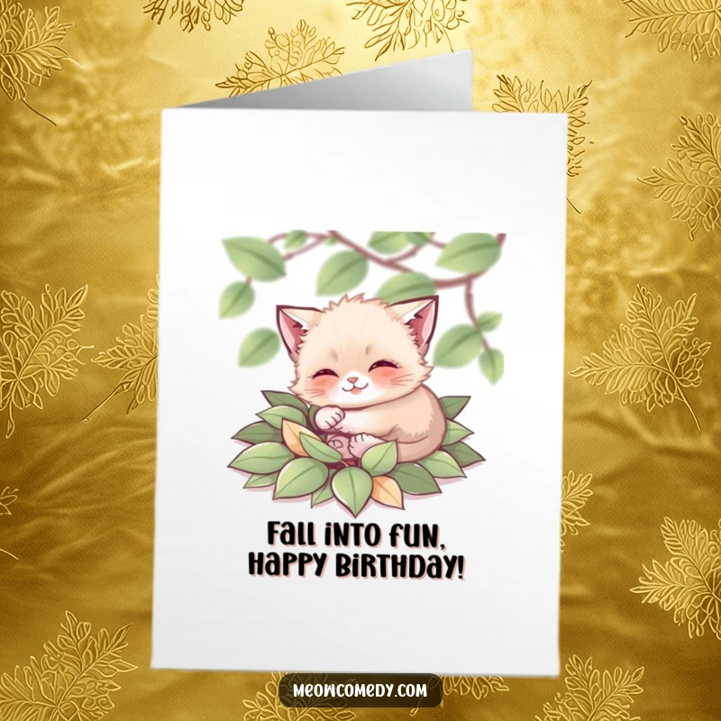 Funny Free Printable Birthday Card: A tiny cat joyfully rolls in a big pile of colorful, soft autumn leaves.