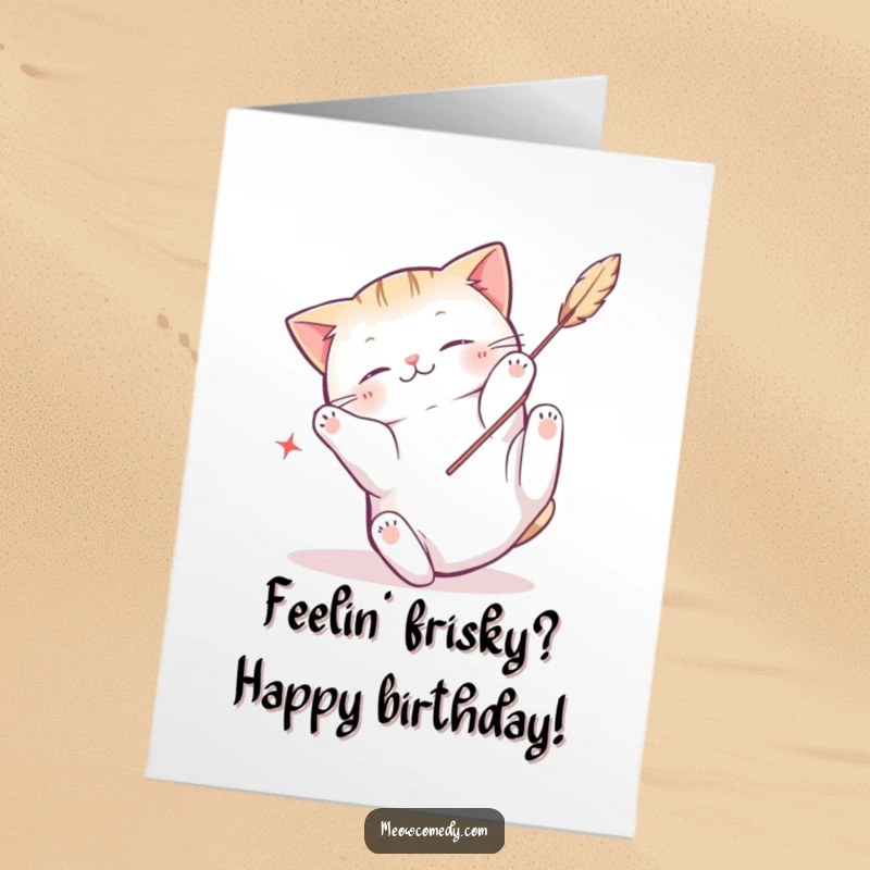 Funny Free Printable Birthday Card: Kawaii cat tumbling playfully while batting at a feather toy, energetic and cute.