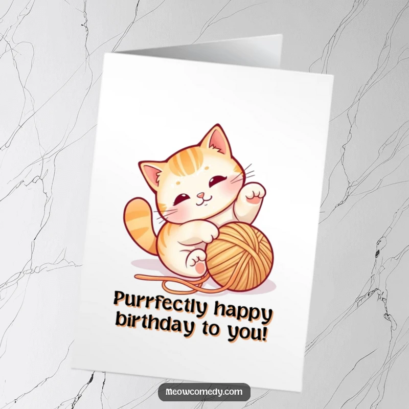 Funny Free Printable Birthday Card showing a playful cat comically tumbling head over paws with a ball of bright red yarn.