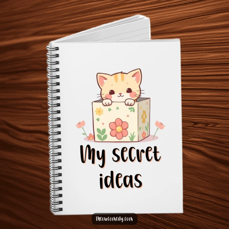 Funny kawaii cat peeking from inside a whimsical, decorated box, designed for creative and charming note-taking in a notebook.