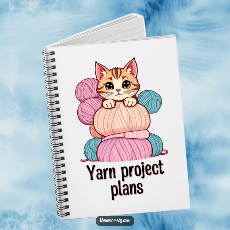 Funny cat notebook showing a mischievous cat peeking over a tall stack of colorful yarn balls with a playful glance.
