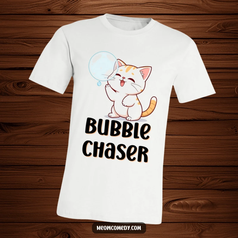 Funny Kawaii Cat T-Shirt: Cartoon cat batting at a floating bubble, a humorous and playful design.