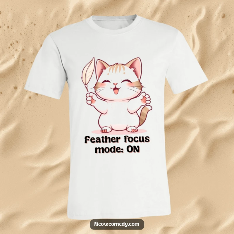 Funny Cat T-Shirt: A joyful cat's paws outstretched, actively and playfully batting at a suspended feather.