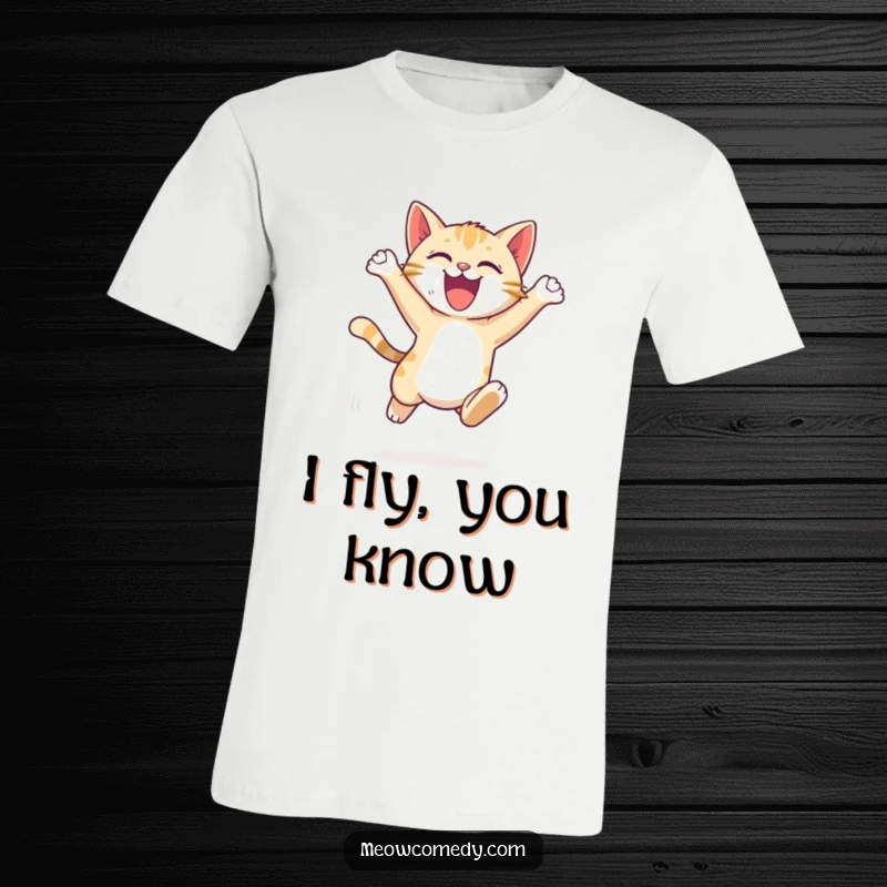 Funny Cat Leap T-Shirt: an energetic cat cub, performing a graceful leap with excitement, conveying agility and fun.