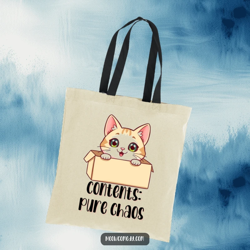 Funny Cat Tote Bag: A playful cat peering out of a box, eyes wide with excitement, perfect for carrying your treasures.